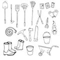 Set of black and white drawings of garden tools. Vector