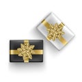 Set of Black and white gift boxes with realistic gold ribbon, Top view. Birthday or anniversary present, Holiday decoration Royalty Free Stock Photo