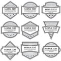 Set of black and white ornate labels on white background.