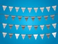 A set of black and white ribbons on rope in blue background for designing house and office