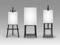 Set of Black Wooden Easels with Blank Canvases