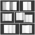 Set of blank brochures on dark grey background, top view. Mock up for Royalty Free Stock Photo