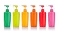 Set blank green, yellow, pink, orange and red plastic pump bottle used for shampoo or soap. Studio shot isolated on white Royalty Free Stock Photo