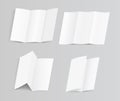 Set of blank trifold paper brochure mock-up on soft gray background with shadows Royalty Free Stock Photo