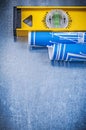 Set of blue construction drawings level on metallic background Royalty Free Stock Photo