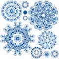 Set of blue floral circle patterns. Background in the style