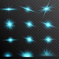 Set blue glow light lens effect sparkles on transparent background. Royalty Free Stock Photo