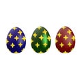 A set of blue, green and red Easter eggs with a gold pattern