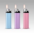 Set of Blue Purple Pink Plastic Lighters with Flame Royalty Free Stock Photo