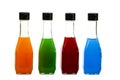 Set of blue red green orange cocktails in glass bottles isolated on a white background. Set of cocktails with martini and freshly