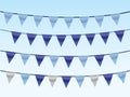 A set of blue ribbons on rope in blue background for designing house and office