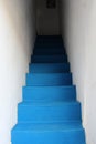 A set of blue stairs.