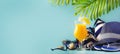 Set of blue white summer beach things in nautical style for vacation with orange cocktail on blue long background, space for text Royalty Free Stock Photo