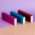 Set of bluetooth speakers different colors on colorful background
