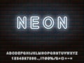 Set of bold rounded white neon font. Letters, numerals, signs, icons for web design and advertising Royalty Free Stock Photo