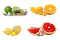 Set with bottles of different essential oils and fresh citruses on background
