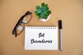 Set boundaries, typography of the word Set Boundaries written on a notebook