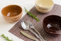 Set of bowls with fork, spoon and knife. Written breakfas, lunch Royalty Free Stock Photo