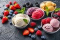 Set of bowls with various colorful Ice Cream scoops with different flavors and fresh ingredients on black background, top view. Royalty Free Stock Photo