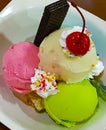 Set of bowls with various colorful Ice Cream scoops with different flavors and fresh ingredients, chocolate, vanilla, and