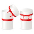 Set of box opening. Closed and open gift box with red satin ribbons and bow. White round containers isolated on white Royalty Free Stock Photo