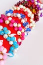 Set of bracelets. Beautiful colorful bracelets with plastic beads and leaves Royalty Free Stock Photo