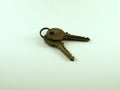 A Set of Brass Keys on a Small Silver Key Ring Royalty Free Stock Photo