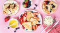Set of Breakfast pancakes on a pastel pink background. Top view, flat lay Royalty Free Stock Photo