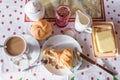 breakfast table with coffee sugar milk and butter and roll covered with euro coins and banknotes on plate, Germany Royalty Free Stock Photo