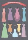 Set of bridesmaid dresses hang on ribbons