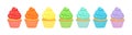 Set of bright cupcakes in rainbow colors isolated on white background.