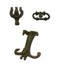 A set of bronze items from the archaic period. Bronze handles, household items in the form of sphinxes and horses Royalty Free Stock Photo