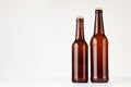 Set of brown longneck beer bottles 500ml and 330ml mock up.