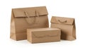 Set of brown paper bags and boxes isolated on white background Royalty Free Stock Photo