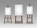 Set of Brown Wooden Easels with Mock Up Canvases