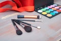 A set of brushes, powder, foundation for makeup.