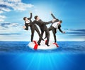 Set of buisnessmen on lifebuoy Royalty Free Stock Photo