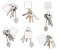 Set of bunch of door keys with blank keychain Royalty Free Stock Photo