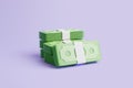 Set of Bundles of money on purple background Royalty Free Stock Photo