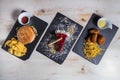 Set with burger, croquetes and cheese cake Royalty Free Stock Photo