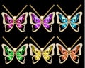 set of butterfly pendants with precious stones