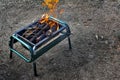 Set on camping fire on aluminium tripod Royalty Free Stock Photo