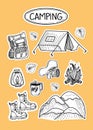 A set of camping-themed stickers, with hand-drawn doodle-style elements. Backpack, tent, boots, mountains, fire, etc Royalty Free Stock Photo