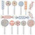 Set of candies, lollipop, sugar caramel in wrapper and twisted marshmallow on stick
