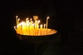 Set of Candles in the dark of a church Royalty Free Stock Photo