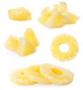 Set of canned pineapple rings and pieces on background Royalty Free Stock Photo