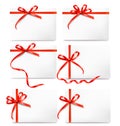 Set of card note with red gift bows with ribbons Royalty Free Stock Photo