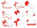 Set of card notes with red gift bows with ribbons Royalty Free Stock Photo
