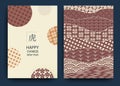 A set of cards for the celebration of the Chinese New Year of the Tiger with traditional patterns and symbols
