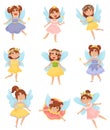 Set of cartoon fairies with wings in colorful dresses. Vector illustration on a white background. Royalty Free Stock Photo